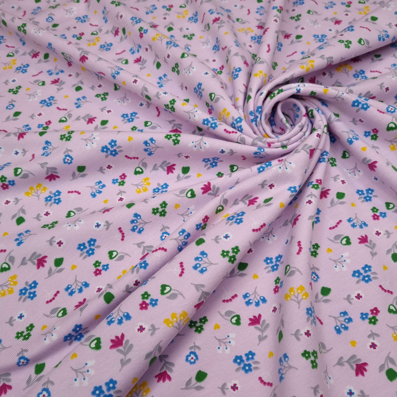 Jersey di Cotone H 140 cm - FIORI MULTICOLOR FONDO ROSA